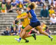 8 May 2022; Geraldine McLaughlin of Donegal in action against Zara Fay of Cavan during the Ulster Ladies Football Senior Championship Semi-Final match between Cavan and Donegal at St Tiernach's Park in Clones, Monaghan. Photo by Piaras Ó Mídheach/Sportsfile