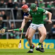8 May 2022; William O'Donoghue of Limerick is tackled by Dillon Quirke of Tipperary during the Munster GAA Hurling Senior Championship Round 3 match between Limerick and Tipperary at TUS Gaelic Grounds in Limerick. Photo by Ray McManus/Sportsfile
