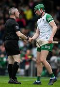 8 May 2022; Referee Liam Gordon shakes hands with Limerick goalkeeper Nickie Quaid before the Munster GAA Hurling Senior Championship Round 3 match between Limerick and Tipperary at TUS Gaelic Grounds in Limerick. Photo by Ray McManus/Sportsfile