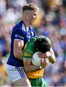 8 May 2022; Ryan McHugh of Donegal is tackled by Paddy Lynch of Cavan during the Ulster GAA Football Senior Championship Semi-Final match between Cavan and Donegal at St Tiernach's Park in Clones, Monaghan. Photo by Piaras Ó Mídheach/Sportsfile