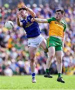 8 May 2022; Gerard Smith of Cavan in action against Shane O'Donnell of Donegal during the Ulster GAA Football Senior Championship Semi-Final match between Cavan and Donegal at St Tiernach's Park in Clones, Monaghan. Photo by Piaras Ó Mídheach/Sportsfile