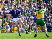 8 May 2022; Gearóid McKiernan of Cavan shoots under pressure from Ciarán Thompson of Donegal during the Ulster GAA Football Senior Championship Semi-Final match between Cavan and Donegal at St Tiernach's Park in Clones, Monaghan. Photo by Piaras Ó Mídheach/Sportsfile