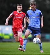 6 May 2022; Mark Dignam of UCD and Lewis Macari of Dundalk during the SSE Airtricity League Premier Division match between UCD and Dundalk at UCD Bowl in Belfield, Dublin. Photo by Ben McShane/Sportsfile