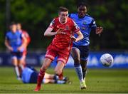 6 May 2022; Daniel Kelly of Dundalk and Eric Yoro of UCD during the SSE Airtricity League Premier Division match between UCD and Dundalk at UCD Bowl in Belfield, Dublin. Photo by Ben McShane/Sportsfile