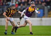 9 May 2022; Eoin Ryan of Wexford in action against Billy Drennan of Kilkenny during the oneills.com Leinster GAA Hurling U20 Championship Final match between Wexford and Kilkenny at Netwatch Cullen Park in Carlow. Photo by Piaras Ó Mídheach/Sportsfile