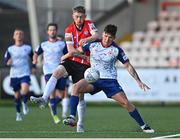 9 May 2022; Joe Redmond of St Patrick's Athletic in action against Jamie McGonigle of Derry City during the SSE Airtricity League Premier Division match between Derry City and St Patrick's Athletic at The Ryan McBride Brandywell Stadium in Derry. Photo by Ramsey Cardy/Sportsfile