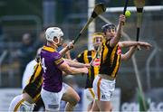 9 May 2022; Jack Redmond of Wexford hits a shot wide in injury-time of the second half, under pressure from Padraig Moylan of Kilkenny, right, during the oneills.com Leinster GAA Hurling U20 Championship Final match between Wexford and Kilkenny at Netwatch Cullen Park in Carlow. Photo by Piaras Ó Mídheach/Sportsfile