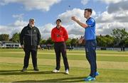 10 May 2022; Leinster Lightning captain George Dockrell, right, makes the toss watched by Munster Reds captain PJ Moor and match referee Kevin Gallagher before the Cricket Ireland Inter-Provincial Cup match between Leinster Lightning and Munster Reds at Pembroke Cricket Club in Dublin. Photo by Sam Barnes/Sportsfile