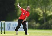 10 May 2022; David Delany of Munster Reds bowls during the Cricket Ireland Inter-Provincial Cup match between Leinster Lightning and Munster Reds at Pembroke Cricket Club in Dublin. Photo by Sam Barnes/Sportsfile