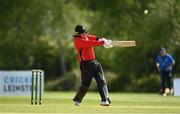 10 May 2022; PJ Moor of Munster Reds hits a six during the Cricket Ireland Inter-Provincial Cup match between Leinster Lightning and Munster Reds at Pembroke Cricket Club in Dublin. Photo by Sam Barnes/Sportsfile