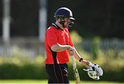 10 May 2022; Tyrone Kane of Munster Reds leaves. the. field afyer being cauught out by Harry Tector of Leinster Lightning during the Cricket Ireland Inter-Provincial Cup match between Leinster Lightning and Munster Reds at Pembroke Cricket Club in Dublin. Photo by Sam Barnes/Sportsfile