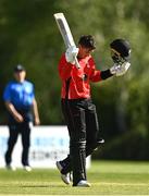 10 May 2022;  PJ Moor of Munster Reds salutes the crowd after bringing up his century during the Cricket Ireland Inter-Provincial Cup match between Leinster Lightning and Munster Reds at Pembroke Cricket Club in Dublin. Photo by Sam Barnes/Sportsfile