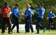 10 May 2022; Mike O'Reilly of Leinster Lightning, centre, celebrates with team-mates after bowling Curtis Campher of Munster Reds during the Cricket Ireland Inter-Provincial Cup match between Leinster Lightning and Munster Reds at Pembroke Cricket Club in Dublin. Photo by Sam Barnes/Sportsfile