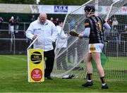 9 May 2022; Umpire Padraig McGovern with Kilkenny goalkeeper Aidan Tallis at the Smart Sliotar container before the start of the second half of the oneills.com Leinster GAA Hurling U20 Championship Final match between Wexford and Kilkenny at Netwatch Cullen Park in Carlow. Photo by Piaras Ó Mídheach/Sportsfile