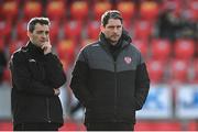 9 May 2022; Derry City manager Ruaidhrí Higgins, left, and physiotherapist Michael Hegarty before the SSE Airtricity League Premier Division match between Derry City and St Patrick's Athletic at The Ryan McBride Brandywell Stadium in Derry. Photo by Ramsey Cardy/Sportsfile
