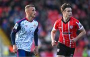 9 May 2022; Sam Curtis of St Patrick's Athletic and Matty Smith of Derry City during the SSE Airtricity League Premier Division match between Derry City and St Patrick's Athletic at The Ryan McBride Brandywell Stadium in Derry. Photo by Ramsey Cardy/Sportsfile