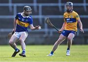 11 May 2022; Conor Martin of Tipperary in action against Seán McMahon of Clare during the Electric Ireland Munster GAA Minor Hurling Championship Final match between Tipperary and Clare at TUS Gaelic Grounds in Limerick. Photo by Piaras Ó Mídheach/Sportsfile
