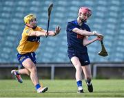 11 May 2022; Tipperary goalkeeper Eoin Horgan is tackled by Sam Scalon of Clare during the Electric Ireland Munster GAA Minor Hurling Championship Final match between Tipperary and Clare at TUS Gaelic Grounds in Limerick. Photo by Piaras Ó Mídheach/Sportsfile