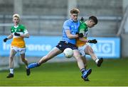 11 May 2022; Cillian Lowry of Offaly in action against Dylan Clark of Dublin during the Electric Ireland Leinster GAA Minor Football Championship Semi-Final match between Dublin and Offaly at Parnell Park in Dublin. Photo by Seb Daly/Sportsfile