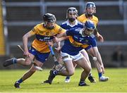 11 May 2022; Ciarán Foley of Tipperary in action against Michael Collins of Clare during the Electric Ireland Munster GAA Minor Hurling Championship Final match between Tipperary and Clare at TUS Gaelic Grounds in Limerick. Photo by Piaras Ó Mídheach/Sportsfile