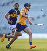 11 May 2022; Jack O'Neill of Clare in action against Sam O'Farrell of Tipperary during the Electric Ireland Munster GAA Minor Hurling Championship Final match between Tipperary and Clare at TUS Gaelic Grounds in Limerick. Photo by Piaras Ó Mídheach/Sportsfile
