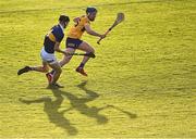 11 May 2022; Cian Neylon of Clare in action against Jack Quinlan of Tipperary during the Electric Ireland Munster GAA Minor Hurling Championship Final match between Tipperary and Clare at TUS Gaelic Grounds in Limerick. Photo by Piaras Ó Mídheach/Sportsfile