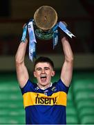11 May 2022; Tipperary captain Sam O'Farrell lifts the cup after his side's victory in the Electric Ireland Munster GAA Minor Hurling Championship Final match between Tipperary and Clare at TUS Gaelic Grounds in Limerick. Photo by Piaras Ó Mídheach/Sportsfile