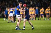 11 May 2022; Tipperary players Joe Egan, left, and Eoin Horgan celebrate after their side's victory in the penalty shoot-out of the Electric Ireland Munster GAA Minor Hurling Championship Final match between Tipperary and Clare at TUS Gaelic Grounds in Limerick. Photo by Piaras Ó Mídheach/Sportsfile