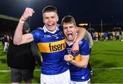 11 May 2022; Tipperary players Aaron O'Halloran, left, and Paddy Phelan celebrate after their side's victory in the penalty shoot-out of the Electric Ireland Munster GAA Minor Hurling Championship Final match between Tipperary and Clare at TUS Gaelic Grounds in Limerick. Photo by Piaras Ó Mídheach/Sportsfile