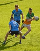 11 May 2022; Shane Rigney of Offaly in action against James Brady and Dylan Clark of Dublin during the Electric Ireland Leinster GAA Minor Football Championship Semi-Final match between Dublin and Offaly at Parnell Park in Dublin. Photo by Seb Daly/Sportsfile