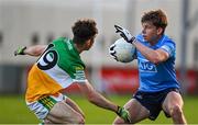 11 May 2022; Charlie McMorrow of Dublin in action against Ben Kennedy of Offaly during the Electric Ireland Leinster GAA Minor Football Championship Semi-Final match between Dublin and Offaly at Parnell Park in Dublin. Photo by Seb Daly/Sportsfile