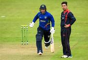 12 May 2022; Andy McBrine of North West Warriors makes a run as Ruhan Pretorius of Northern Knights looks on during the Cricket Ireland Inter-Provincial Cup match between North West Warriors and Northern Knights at Bready Cricket Club in Magheramason, Tyrone. Photo by Stephen McCarthy/Sportsfile