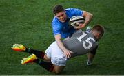 13 May 2022; Rob Russell of Leinster is tackled by Taylor Gleeson of Irish Universities during the Development Match between Leinster Rugby A and Irish Universities XV at Energia Park in Dublin. Photo by Harry Murphy/Sportsfile