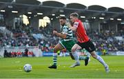 13 May 2022; Roberto Lopes of Shamrock Rovers in action against Jamie McGonigle of Derry City during the SSE Airtricity League Premier Division match between Shamrock Rovers and Derry City at Tallaght Stadium in Dublin. Photo by Seb Daly/Sportsfile