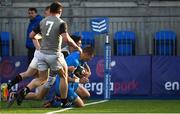 13 May 2022; Sam Prendergast of Leinster on his way to scoring his side's first try despite the tackle of Louis O'Reilly of Irish Universities during the Development Match between Leinster Rugby A and Irish Universities XV at Energia Park in Dublin. Photo by Harry Murphy/Sportsfile