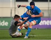 13 May 2022; Ryan Baird of Leinster is tackled by Harry Sheridan of Irish Universities during the Development Match between Leinster Rugby A and Irish Universities XV at Energia Park in Dublin. Photo by Harry Murphy/Sportsfile