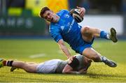 13 May 2022; Rob Russell of Leinster is tackled by Joe O'Leary of Irish Universities during the Development Match between Leinster Rugby A and Irish Universities XV at Energia Park in Dublin. Photo by Harry Murphy/Sportsfile