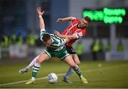 13 May 2022; Andy Lyons of Shamrock Rovers in action against Ronan Boyce of Derry City during the SSE Airtricity League Premier Division match between Shamrock Rovers and Derry City at Tallaght Stadium in Dublin.  Photo by Stephen McCarthy/Sportsfile