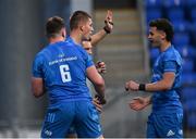 13 May 2022; Sam Prendergast of Leinster, centre, celebrates with teammate Diarmuid Mangan and Michael Moloney after scoring a try during the Development Match between Leinster Rugby A and Irish Universities XV at Energia Park in Dublin. Photo by Harry Murphy/Sportsfile