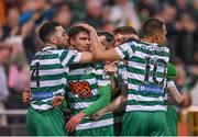 13 May 2022; Danny Mandroiu of Shamrock Rovers, centre, celebrates with teammates Roberto Lopes, left, and Graham Burke after scoring their side's first goal during the SSE Airtricity League Premier Division match between Shamrock Rovers and Derry City at Tallaght Stadium in Dublin. Photo by Seb Daly/Sportsfile