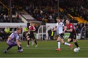 13 May 2022; Daniel Kelly of Dundalk passes to Dundalk teammate Robbie Benson to setup his side's second goal during the SSE Airtricity League Premier Division match between Dundalk and Bohemians at Oriel Park in Dundalk, Louth. Photo by Ramsey Cardy/Sportsfile