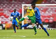 14 May 2022; Ken Hoey of Rockmount AFC in action against Noeem Adekunle of Bluebell United during the FAI Centenary Intermediate Cup Final 2021/2022 match between Rockmount AFC and Bluebell United at Turner's Cross in Cork. Photo by Seb Daly/Sportsfile