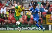 14 May 2022; Cian Murphy of Rockmount AFC in action against Brian Cabreley of Bluebell United during the FAI Centenary Intermediate Cup Final 2021/2022 match between Rockmount AFC and Bluebell United at Turner's Cross in Cork. Photo by Seb Daly/Sportsfile