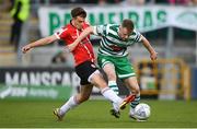 13 May 2022; Sean Hoare of Shamrock Rovers in action against Matty Smith of Derry City during the SSE Airtricity League Premier Division match between Shamrock Rovers and Derry City at Tallaght Stadium in Dublin.  Photo by Stephen McCarthy/Sportsfile