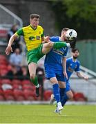 14 May 2022; Luke Casey of Rockmount AFC in action against Daniel Ridge of Bluebell United during the FAI Centenary Intermediate Cup Final 2021/2022 match between Rockmount AFC and Bluebell United at Turner's Cross in Cork. Photo by Seb Daly/Sportsfile