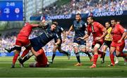 14 May 2022; Robbie Henshaw of Leinster is tackled by Pita Ahki, left, and Julien Marchand of Toulouse during the Heineken Champions Cup Semi-Final match between Leinster and Toulouse at Aviva Stadium in Dublin. Photo by Ramsey Cardy/Sportsfile