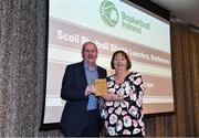 14 May 2022; Scoil Phobail Sliabh Luachra Rathmore coach Jim Hughes collects the Boys A School of the Year award from Chair of the Post Primary Schools Committee, Marie O’Toole, on behalf of Scoil Phobail Sliabh Luachra, Rathmore, Kerry, during the 2021/22 Basketball Ireland Annual Awards and Hall of Fame ceremony in Dublin on Saturday at Royal Marine Hotel in Dun Laoghaire, Dublin. Photo by Sam Barnes/Sportsfile