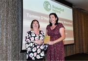 14 May 2022; WIT Waterford Wildcats assistant coach Jillian Hayes, right, collects the Girls School Coach of the Year award from Chair of the Post Primary Schools Committee, Marie O’Toole, on behalf of Mercy Secondary School Waterford coach Tommy O'Mahony, during the 2021/22 Basketball Ireland Annual Awards and Hall of Fame ceremony in Dublin on Saturday at Royal Marine Hotel in Dun Laoghaire, Dublin. Photo by Sam Barnes/Sportsfile