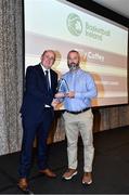 14 May 2022; A member of the Coffey family collects the 2021 Presidents' Lifetime Achievement Award from Basketball Ireland President PJ Reidy, left, on behalf of the late Billy Coffey, during the 2021/22 Basketball Ireland Annual Awards and Hall of Fame ceremony in Dublin on Saturday at Royal Marine Hotel in Dun Laoghaire, Dublin. Photo by Sam Barnes/Sportsfile