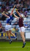 14 May 2022; Daithí Burke of Galway wins possession ahead of Mark Dowling of Laois during the Leinster GAA Hurling Senior Championship Round 4 match between Laois and Galway at MW Hire O’Moore Park in Portlaoise, Laois. Photo by Ray McManus/Sportsfile